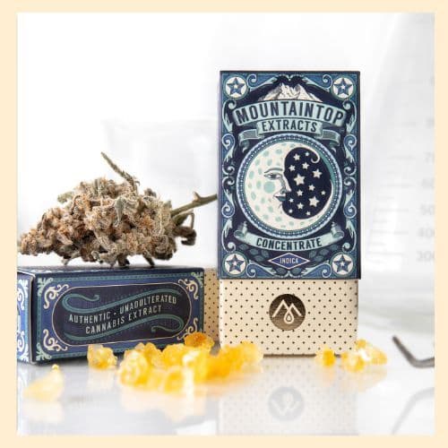 photo of Mountaintop Extracts concentrates packaging, with a big nut sitting on top and gorgeous golden diamonds in front